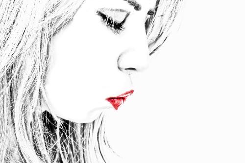 A Kiss - Women with red lipstick with an artistic touch