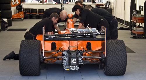 pit crew  - pit crew working on an Indy Lite