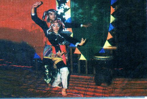 Let us dance! - It is a native dance in the Philippines. It is entitled 'The Giving'
