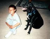 Boy and His Dog - His beloved Cody seems way bigger than him.