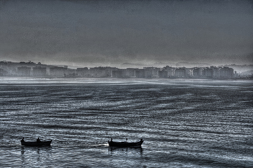 Boats entering Morocco port - Local fishing boats entering the port of Tangier Morocco shot in HDr