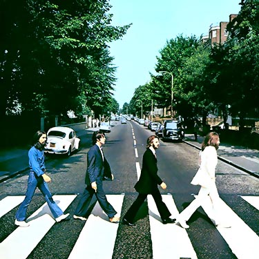 Abbey Road - This is the cover art for The Beatles' 1969 album, 'Abbey Road' All four members can be seen walking towards the right across Abbey Road. The order from left to right are, George Harrison, Paul McCartney, Ringo Starr, and John Lenonn. In the background you can see a white Volkswagen 'Beetle' :)