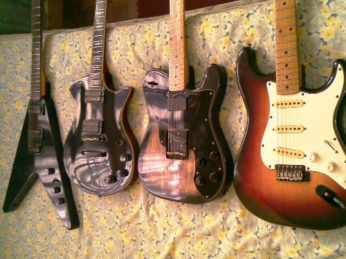 Guitars - My hubby love to collect guitar. He always shop for one.