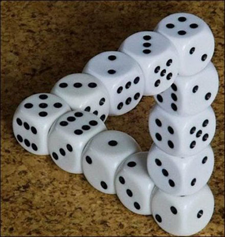 Dice illusion - A very amazing, unique picture. One of the good illusions i've seen. The only thing i could not figure out was the formation of the dice placed.