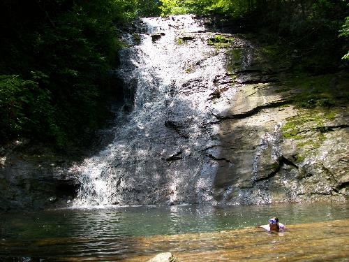 my daughter swimming at the waterfall - It's very cold but she doeasn't care. She loves swimming here.