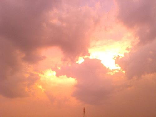 Cloudy sky - This pic was taken from my rooftop. This is one of the best pics that I have taken of nature. Natural light, evening time, this photo says it all.