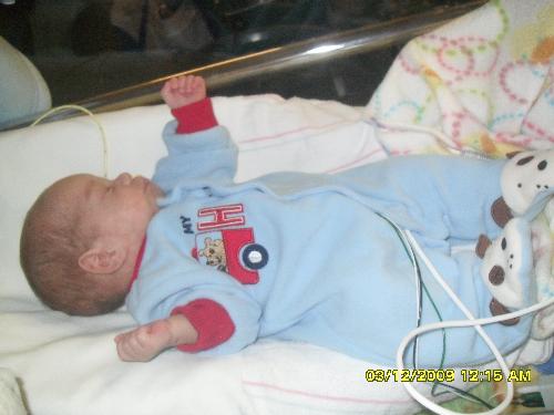 My hero - My premature baby Nehemiah wearing nana's and mommy's favorite preemie outfit