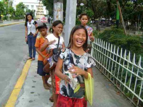 street children - Innocence can sometimes be such a great gift; it is not stained by hatred or greed, just cradled by pure love. This is a picture of the street children in Malolos Bulacan who we encountered in our search for the people to be featured in Heed. Notice how they can still smile despite living a hard life.