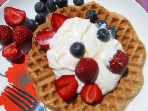 Breakfast meal - Here is a waffle with stawberries and blueberries