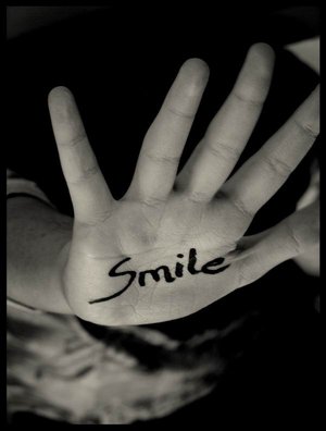 Smile  - I just smile to cover the pain
