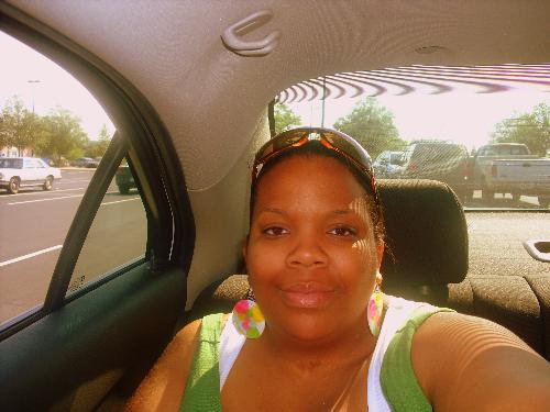 Back of the rental visiting ATL! - I was just sitting in the back of the rental, waiting for my mother to come out the store and it was like 98 degrees outside in the shade I was trying to stay where the air conditioner was.LOL