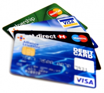 debit and credit cards -  i like to have cards with me to make me perfect..