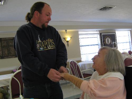 photo of mom getting ring from steven for her birt - Steven giving ring to his grandmother for her birthday.