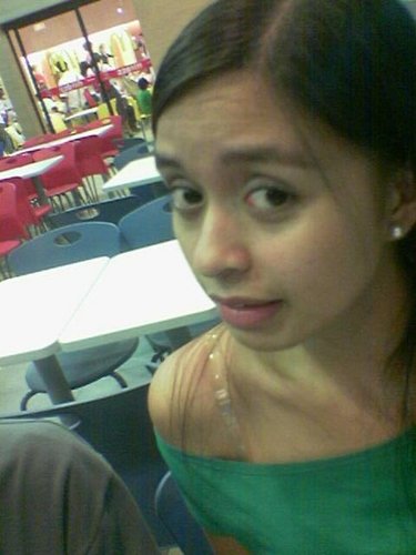 me, myself and i - this was a pic i took while eating with the boyf at mcdo after a day of work. what a nice way to unwind! :)