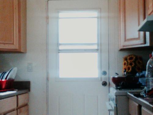 By the kitchen door there was a sound, something w - By the kitchen door there was a sound, something we never heard before.