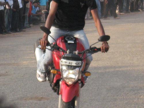 Bike stunt - This a snap of few professional bikers.. performing some stunts for the crowd who gathered for the auto show conducted by an engineering college