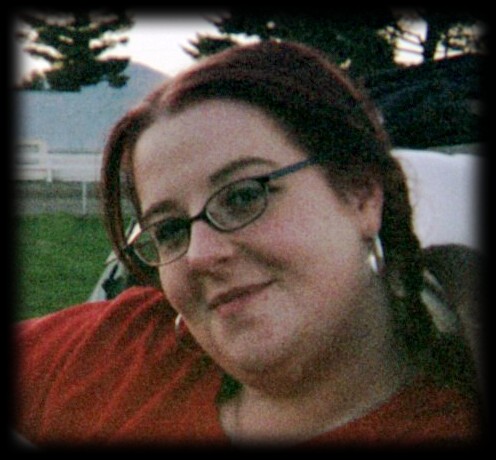 me - me doin' the farm girl thing at the fair, rockin my braids *lol*