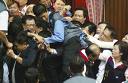 Fighting of Parliament members. - The parliament members are the law makers of a country.But some times they themselves become unruly .Even they use to engage in fighting physically . This is one of the drawbacks of the Parliamentary Democracy. Fighting of Parliament members. - The parliament members are the law makers of a country.But some times they themselves become unruly .Even they use to engage in fighting physically . This is one of the drawbacks of the Parliamentary Democracy.