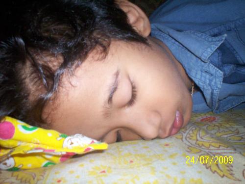 a child havinf a nice sleep - sleeping is necessary