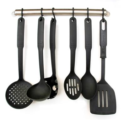 spatulas! - This is the spatula rack I wish I had in my kitchen. Instead, I just have containers from Ikea that everything gets thrown into and is always messy. I have pans and stuff hanging on the walls, but we don't have room for this.