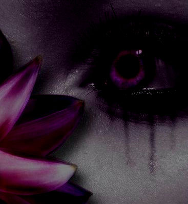 Half a womens face crying. - It reminds me of my self and others who try to hide .Being sad about who you are stinks.