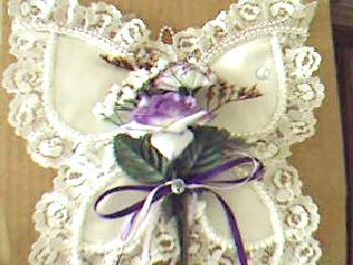 Pretty White Satin and Lace Butterfly - Another creation~I made this pretty satin and lace butterfly for my best friend, she in turn showed it to her friends and I ended up making so many I didn't want to look at it any more. But it is still a favorite on my list.