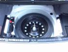 Spare Tire - This is what I call a donut tire. The tiny one that comes with the car.