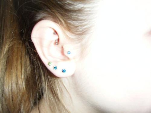 pierced ears - I have 11 piercings... here you can see 5. The ear lobe is triple pierced, then there is a rook and tragus as well.