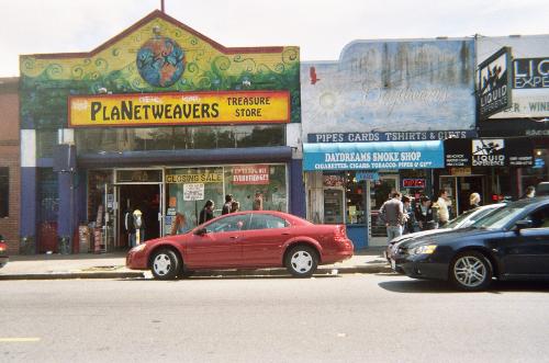 Haight St in San Francisco - This shot is taken from the sidewalk on famous Haight Street in Haight St in San Francisco, CA.