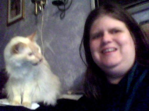 Shakti And I.  - I snapped this picture this afternoon. I was eating slices of Danish liver pate, and I gave shakti a little bit. He sure enjoyed it.