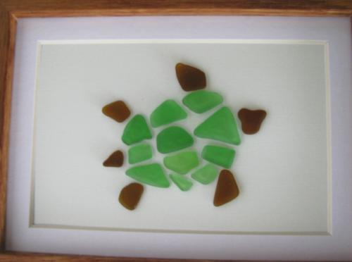 Sea Glass Turtle Mosaic - Several pieces of authentic sea glass was used to create this turtle mosaic. It sits in a 5 x 7 wooden picture frame.