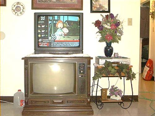 my 'new' ( USED) TV from the next door neighbor! - WOOHOOO! I CAN SEE/READ TEXT and words on TV again! Hot damn!