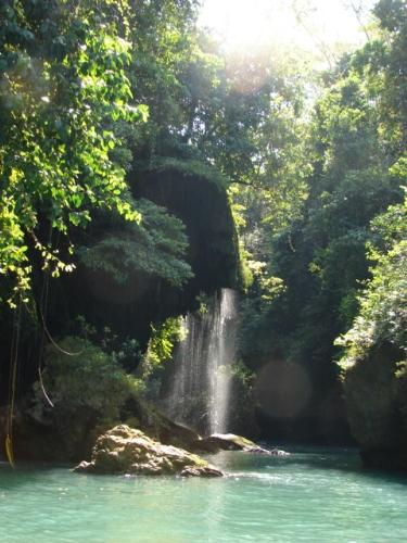 Waterfall in Green Canyon - There's one place for trip in my country, it called 'Green Canyon', because when sun shine brightly, the water has green color but if rains fall the color of the water turns into dark brown. I took this photo in the morning when sun shine quiet bright.. but because last night before I took this photo rain falls heavily, so the green color not really clear. The words 'Canyon' comes from all the cliffs surrounded this place. It's a beautiful place but it's not a well-known place.