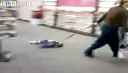 child being dragged by leash! - picture of a mom dragging her toddler in a store by a kids leash!