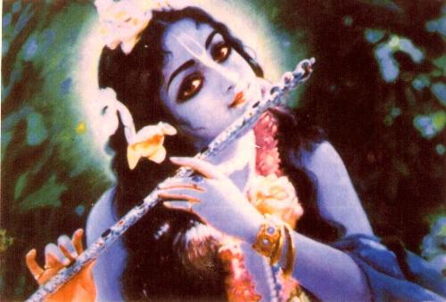 ksihna playing the flute - beautiful photo of Krishna playing the flute