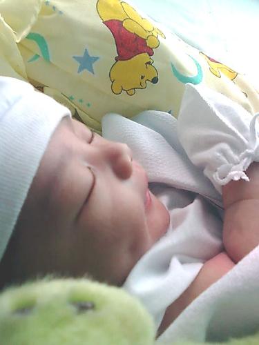 Baby boy peacefully sleeping - Baby boy Frenz smiling while sleeping, maybe he's dreaming!
