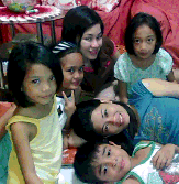 Close Family Ties  - Bonding with the family at the sala while watching tv.