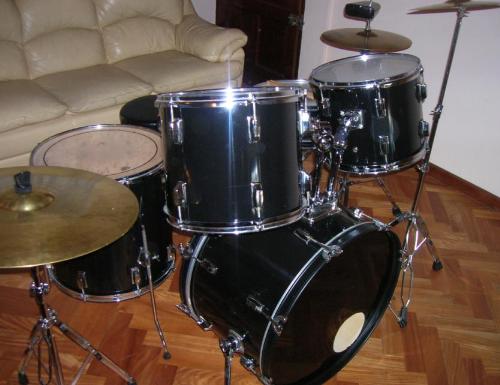 My drums! - It is my thunder drum, i bought it like six years ago... its not really good but i like it! And i have changed a lot of thing of it and i make it sound really good.. The drumkir was bright blue but i changed to black! and it rocks!