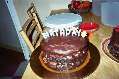 Birthday Cake - This was a birthday cake we made for my mom. It's mostly chocolate, as is the frosting (though I suppose that's obvious). I love those cute candles we found though- they all came in a set. More fun that just having the little plain stick ones- and easier than counting out like 50 candles for my mom!