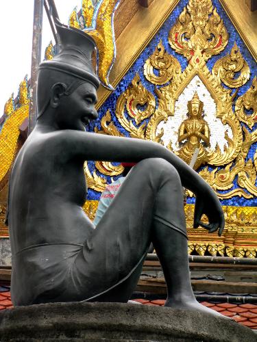 At the Wat. - Statue at a Wat in Thailand.