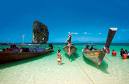 thailand - Long-tail boats rest at Rai Le beach on the Andaman Sea