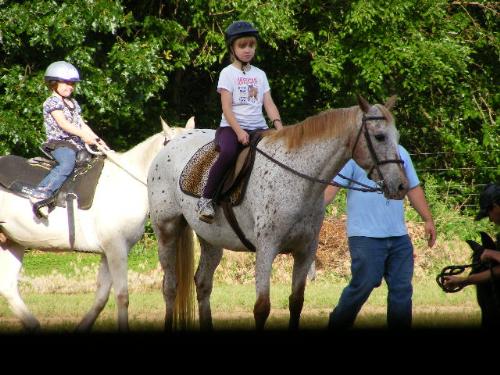 Bible School Horse Camp - MK riding leading the group in for show at end of Bible School Horse Camp. It was wonderful how they used the horses to tie in with lessons -- and as a bonus, the children learned to ride. They loved it!