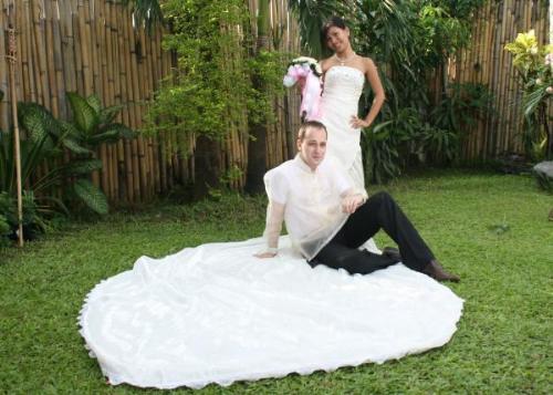 me - me w/ my long wed. gown and my husband sitting on it