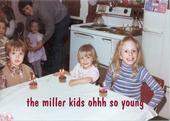 TLC's youth - sister, cousins, and Chimes. Chimes is the one in stripes.