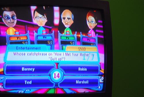 TV Show King Party - playing trivia video game on the Wii