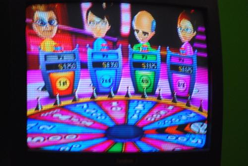 TV Show King Party - playing trivia video game on the Wii