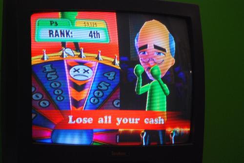 TV Show King Party - playing trivia video game on the wii