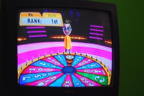 TV Show King Party - playing trivia video game on the Wii
