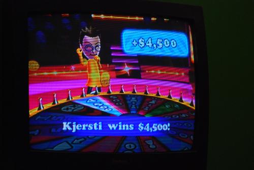 TV Show King Party - playing trivia video game on the Wii