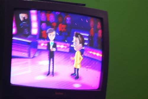 TV Show King Party - playing trivia video game on the Wii